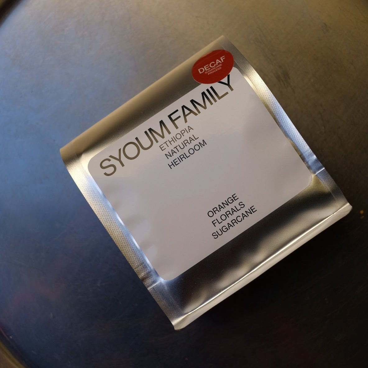 SYOU FAMILY product on a metallic surface